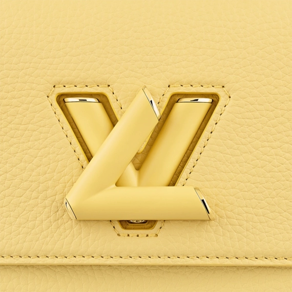 Shop Louis Vuitton Twist PM for Women - Original, Ginger Yellow